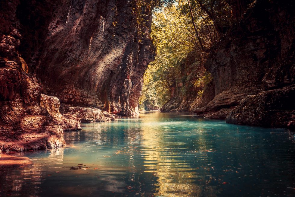 Martvili canyon in Georgia. Beautiful canyon with blue water mountain river. Place to visit. Nature landscape. Travel background. Holiday, rafting, sport, recreation. Vintage retro toning filter SSUCv3H4sIAAAAAAAEAH1Ty26jMBTdj9R/iLwOUwM2kH5ER5pZRl34cUmsGIxsk2lV5d9rICT2TNQN8jn34etzLp9PPzYbxJlTAr1sPicUsNJ6dN4yr0wfaLy98iCVN1YxPZETd5kjyHnmRwcuapEXpW0DLtdapln3EROC9c4bcRqOxpskYLQZLTfvCWkhjHOGjtkT+DgiYTBO+bmNSwKhpHNedRCz4IYYtqFKKxZTg3r3KWF6SWPCHUfvwc7jx/xZSTBcB3YeJFJIMA+HIF2i0Sr7fsGbNXCVZ3oleg3KWkDbKOJGPkX+AHv+JYD1z7+DLhatGZftN+0eNbpXLoe3m2UH6MXHfeBErn3UKMe0IT9zXBV4/ja3lm+3+1I7kurqUfq6L3Fmywpei5xmmO52Gaklz3hT1BkRhFRtWbS7Gh71+m95kuvL/F6zHC6RcxY0sGW390tLdPobzO9mJ69Js/ERZqNUJnL6bATT/+7EYJVQ/SEqM/4YjLxjEf5C00VEb/w8ydVHJMNaTTC8gRJcVLjGpMGY4gatf2ZYRiXjWZWcKgoClFYNZJy0IgsAsp0gPMvLthYNFrUsaZDl8gXjOmWHIQQAAA==